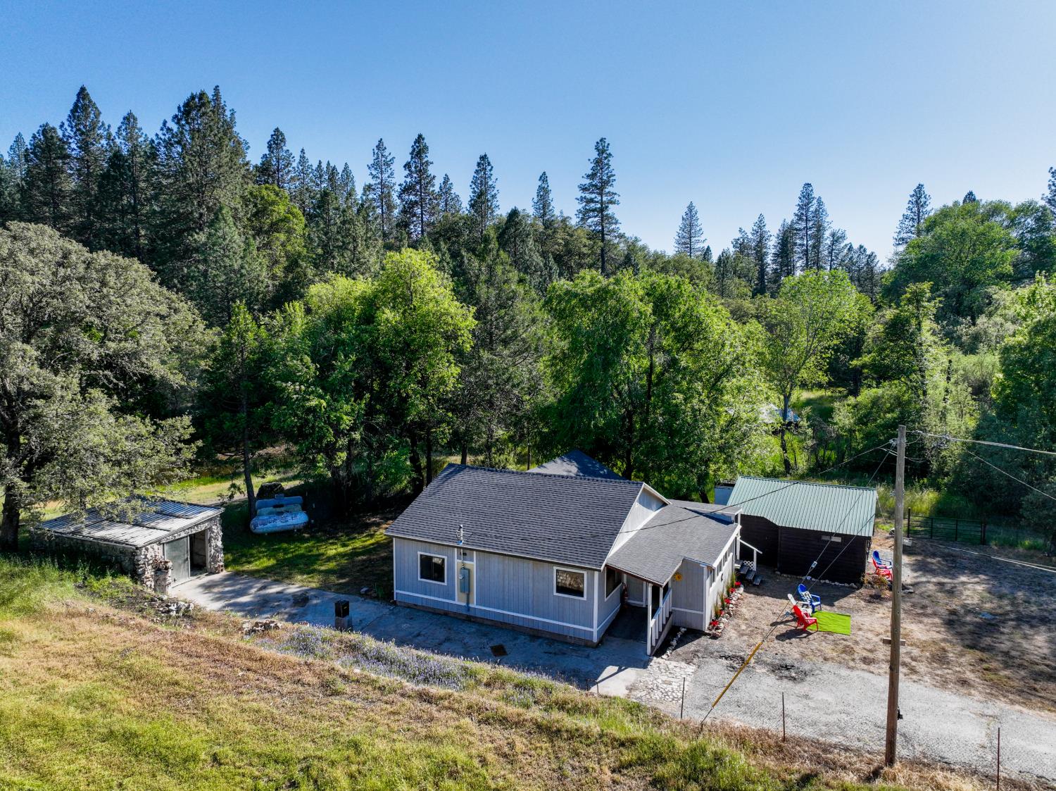 13351 Newtown Road Nevada City, CA 95959 - Photo 15 of 50 an aerial view of a house with garden space and trees all around