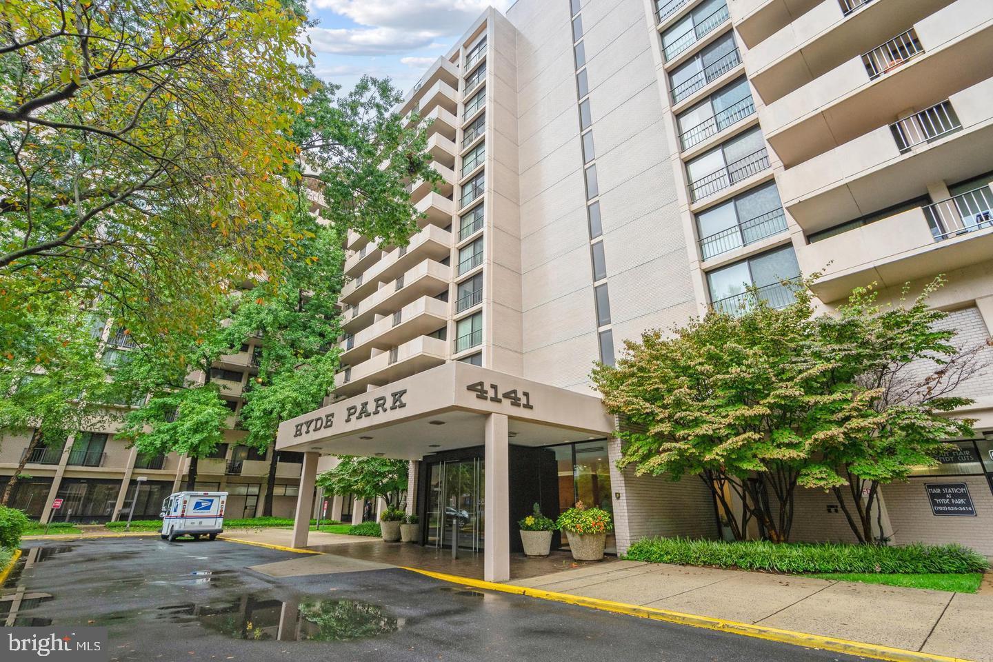 4141 North Henderson Road, Unit 611 Arlington, VA 22203 - Photo 16 of 30 a view of a building with a tree
