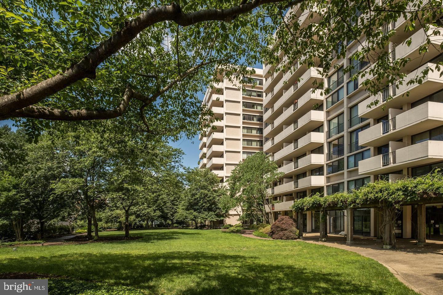 4141 North Henderson Road, Unit 611 Arlington, VA 22203 - Photo 17 of 30 a view of a building with a yard