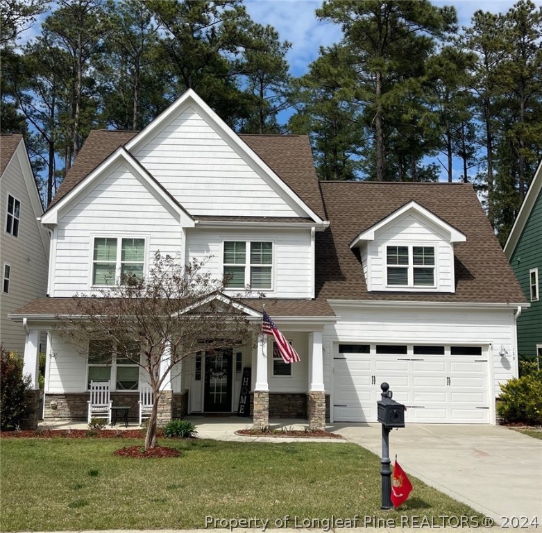 129 Warren Lake Road Aberdeen, NC 28315 - Photo 1 of 50 a front view of a house with a yard