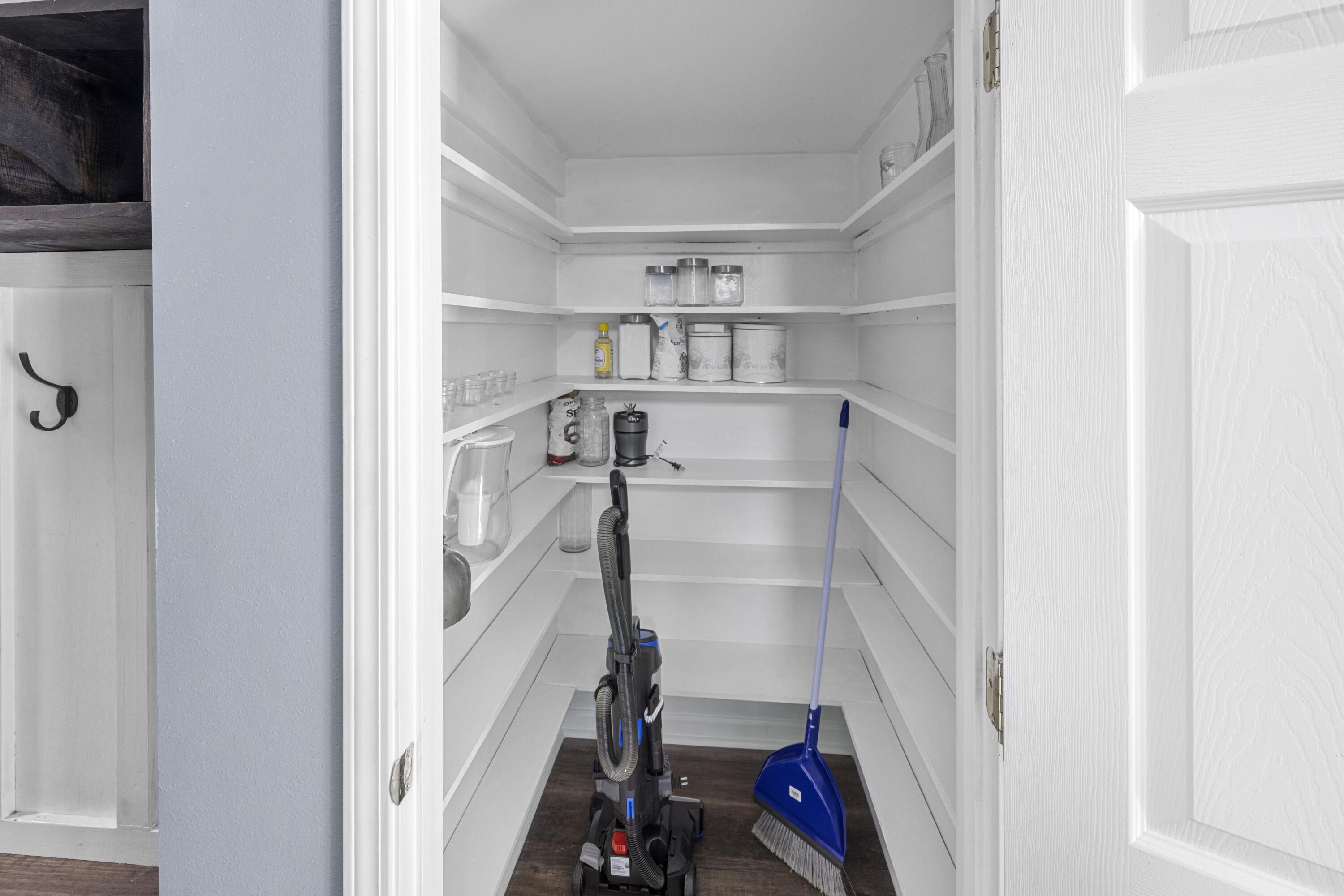313 Crooked Pine Trail Crestview, FL 32539 - Photo 16 of 43 a view of walk in closet with empty racks
