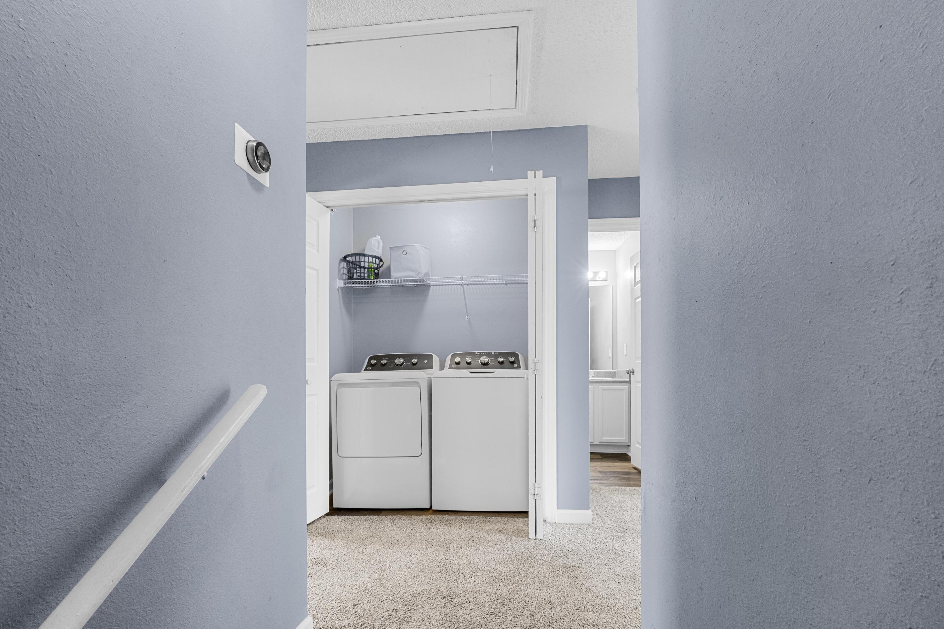 313 Crooked Pine Trail Crestview, FL 32539 - Photo 17 of 43 a hallway with cabinets