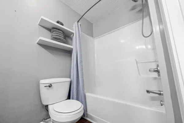 a bathroom with a sink a vanity and a mirror