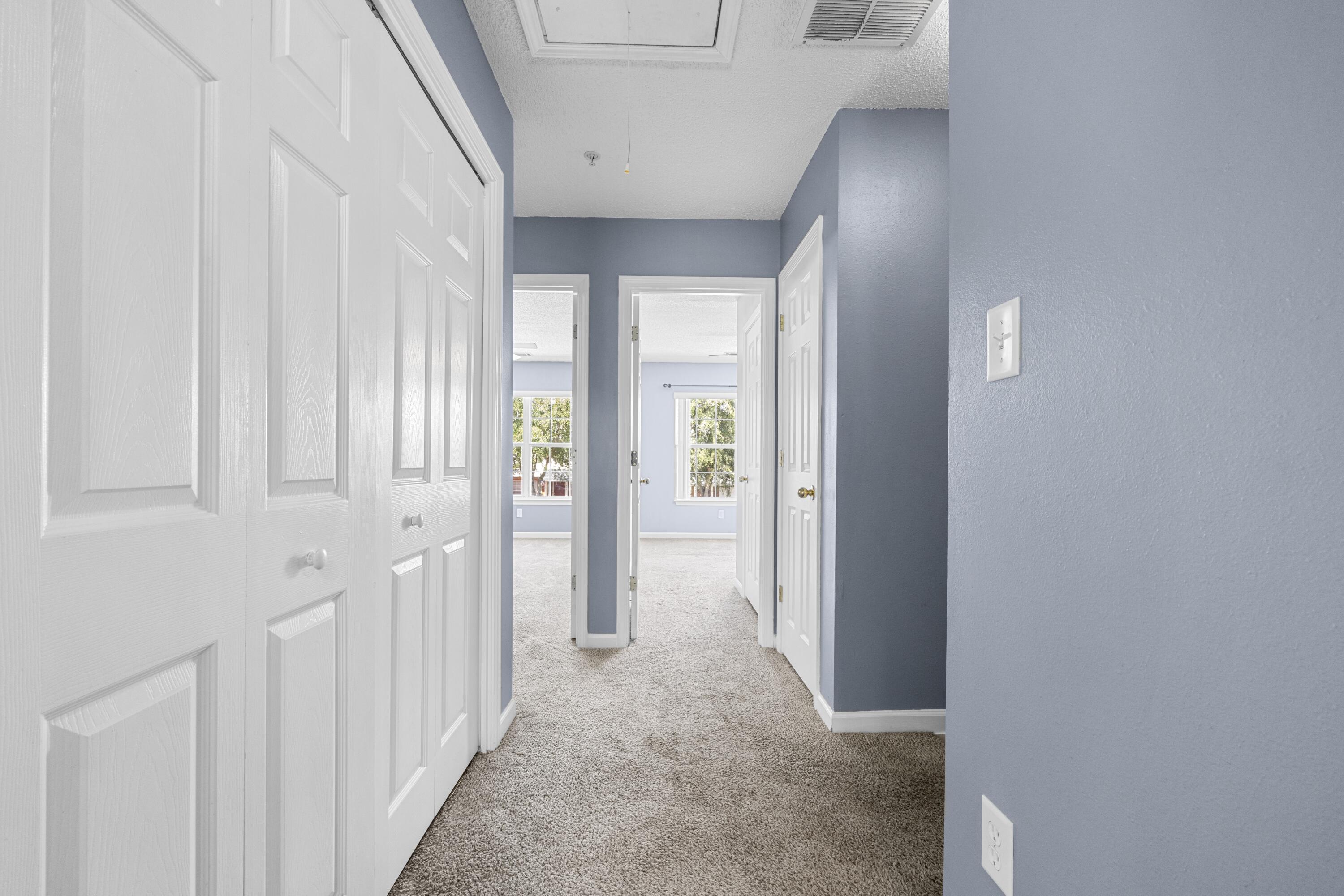 313 Crooked Pine Trail Crestview, FL 32539 - Photo 25 of 43 a view of a hallway with wooden floor and entryway