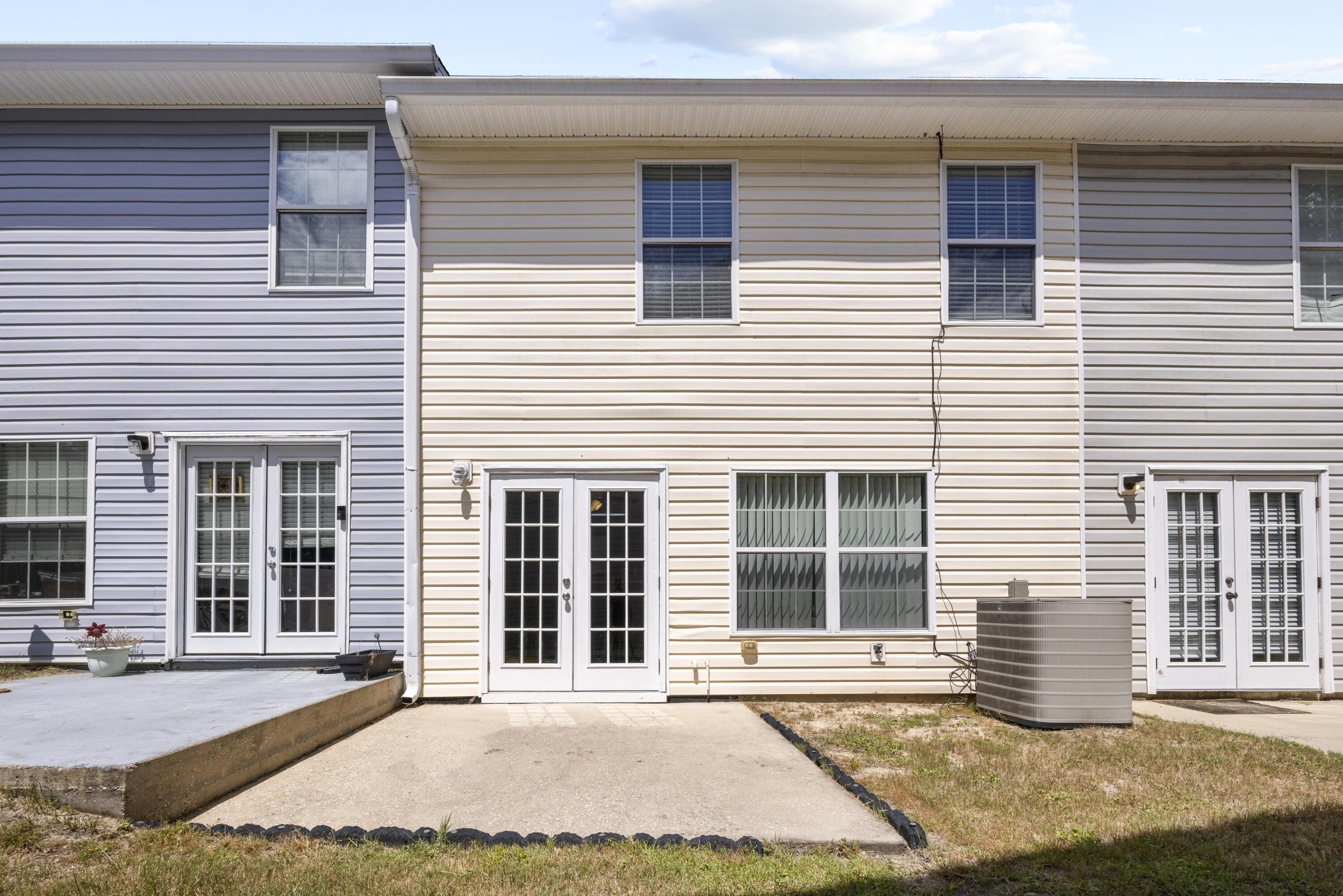 313 Crooked Pine Trail Crestview, FL 32539 - Photo 33 of 43 a front view of a house with a yard