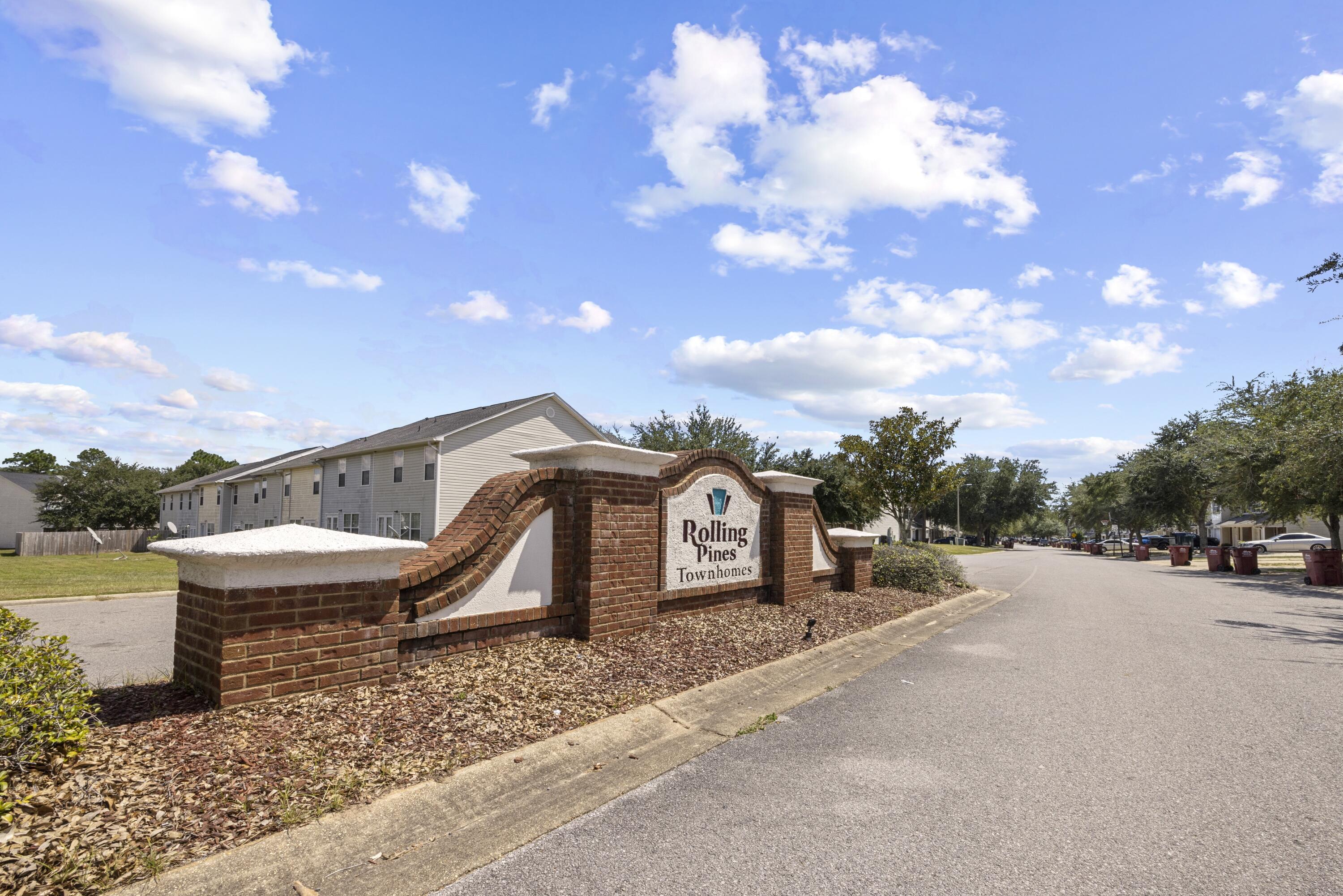 313 Crooked Pine Trail Crestview, FL 32539 - Photo 37 of 43 a view of a dry yard with potted plants
