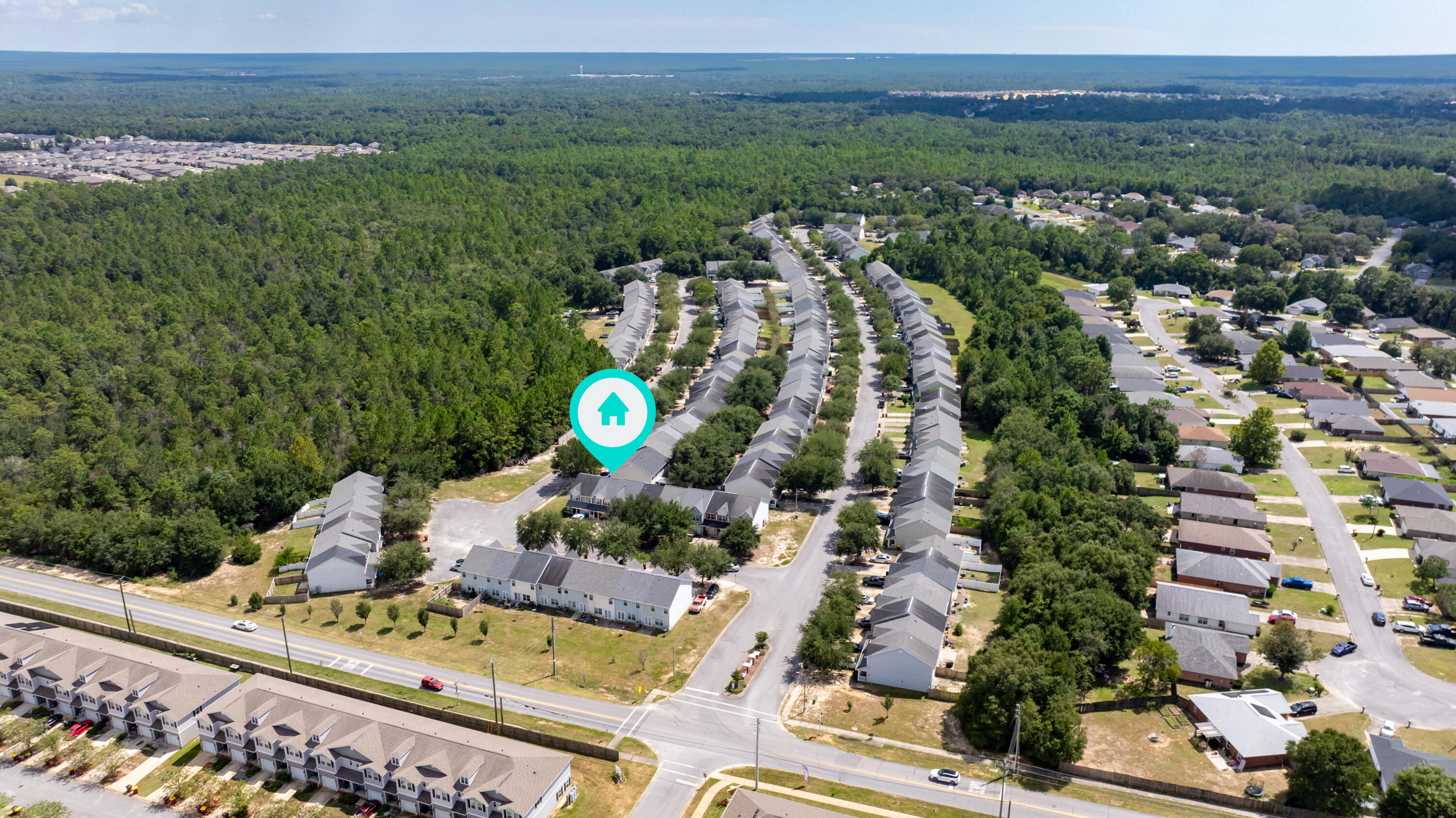 313 Crooked Pine Trail Crestview, FL 32539 - Photo 42 of 43 an aerial view of a house with a yard