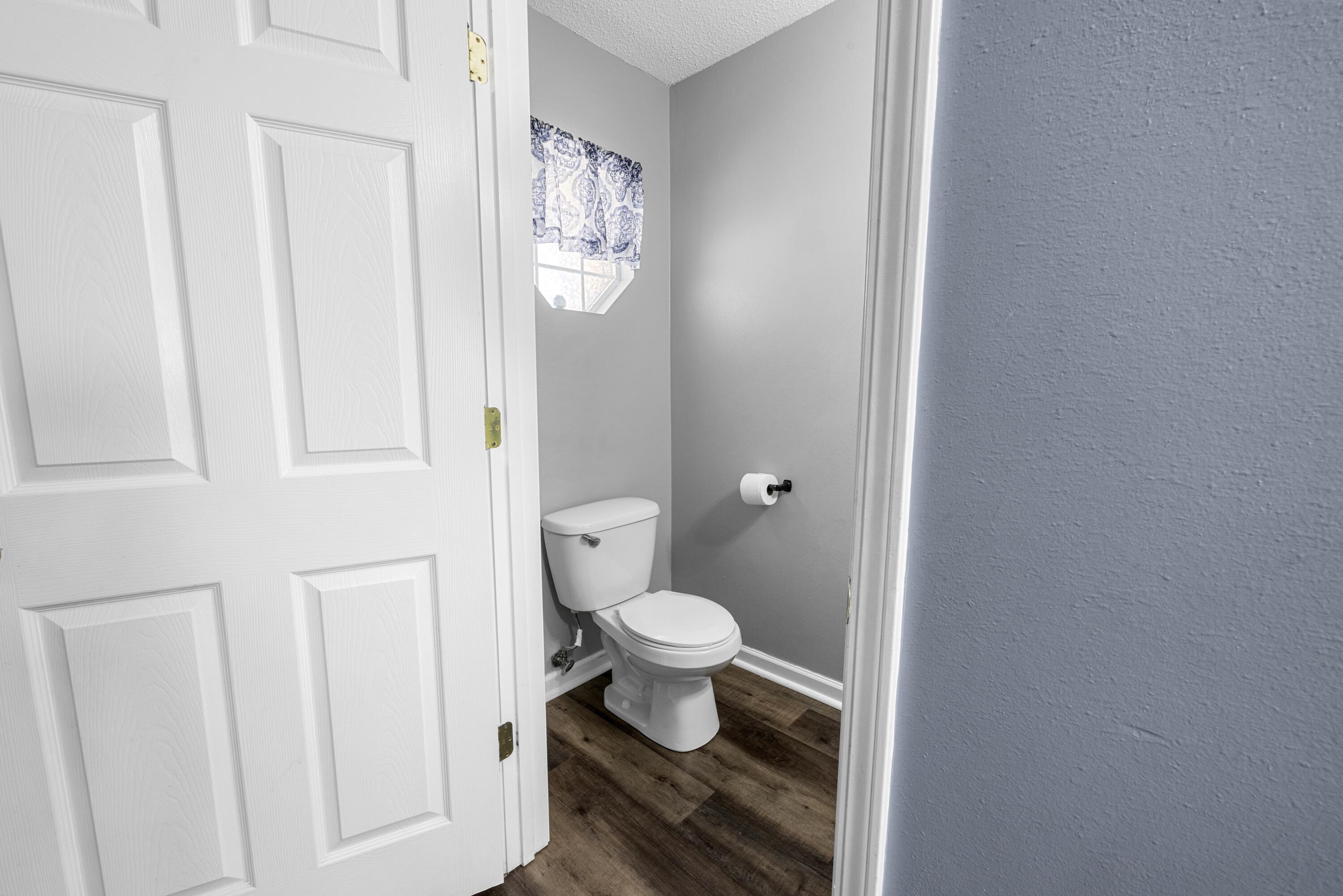313 Crooked Pine Trail Crestview, FL 32539 - Photo 6 of 43 a bathroom with a toilet