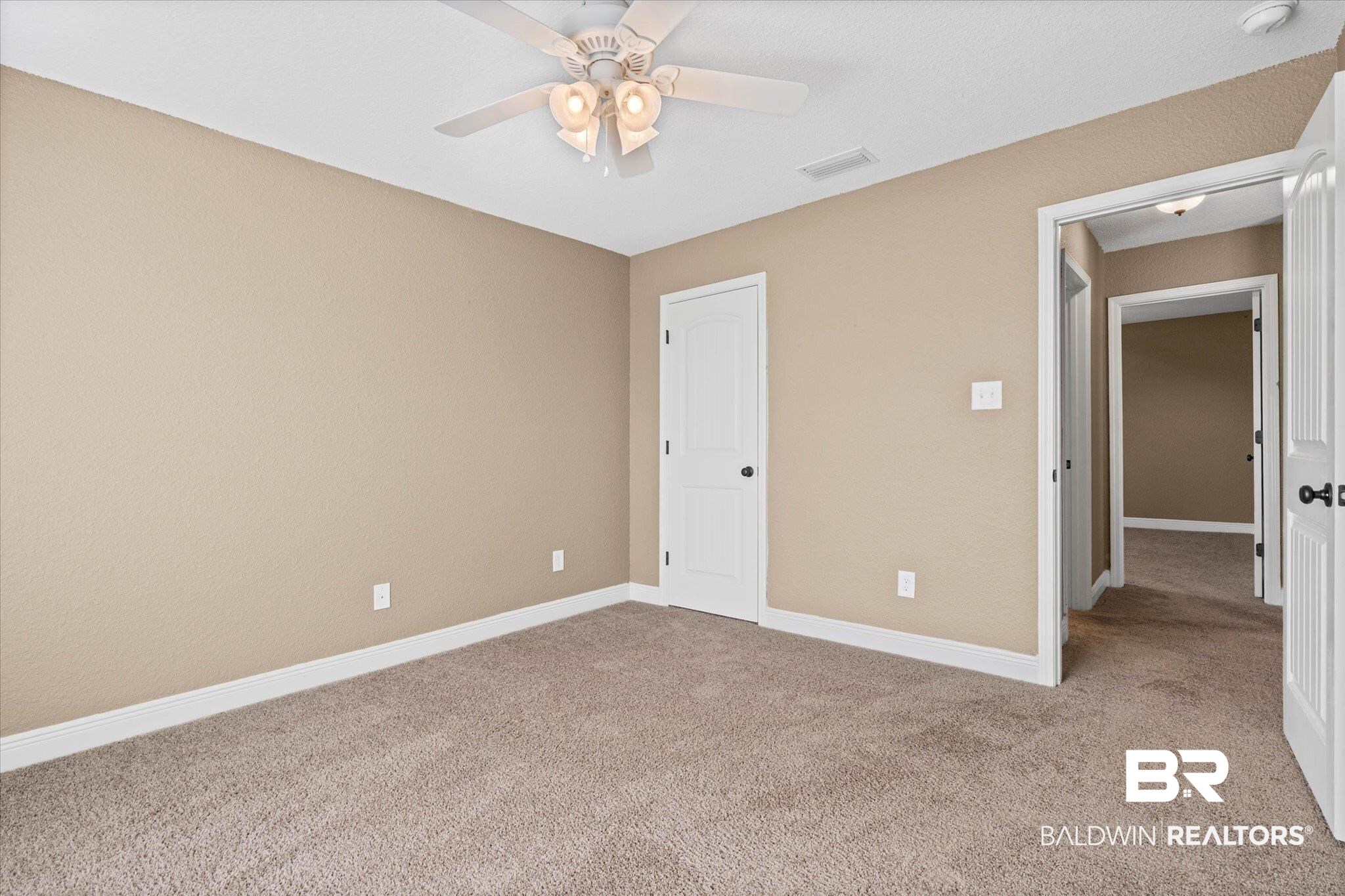 101 Washington Boulevard Foley, AL 36535 - Photo 21 of 32 Unfurnished bedroom featuring light carpet and ceiling fan