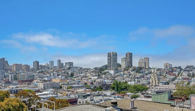 a view of a city with tall buildings