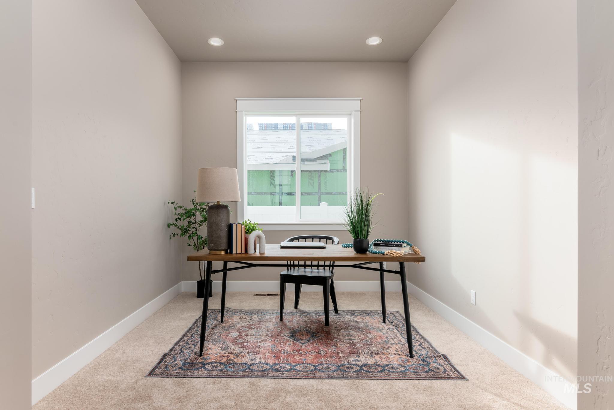 15249 Steel Cloud Avenue Caldwell, ID 83607 - Photo 25 of 46 Office area with light carpet and recessed lighting