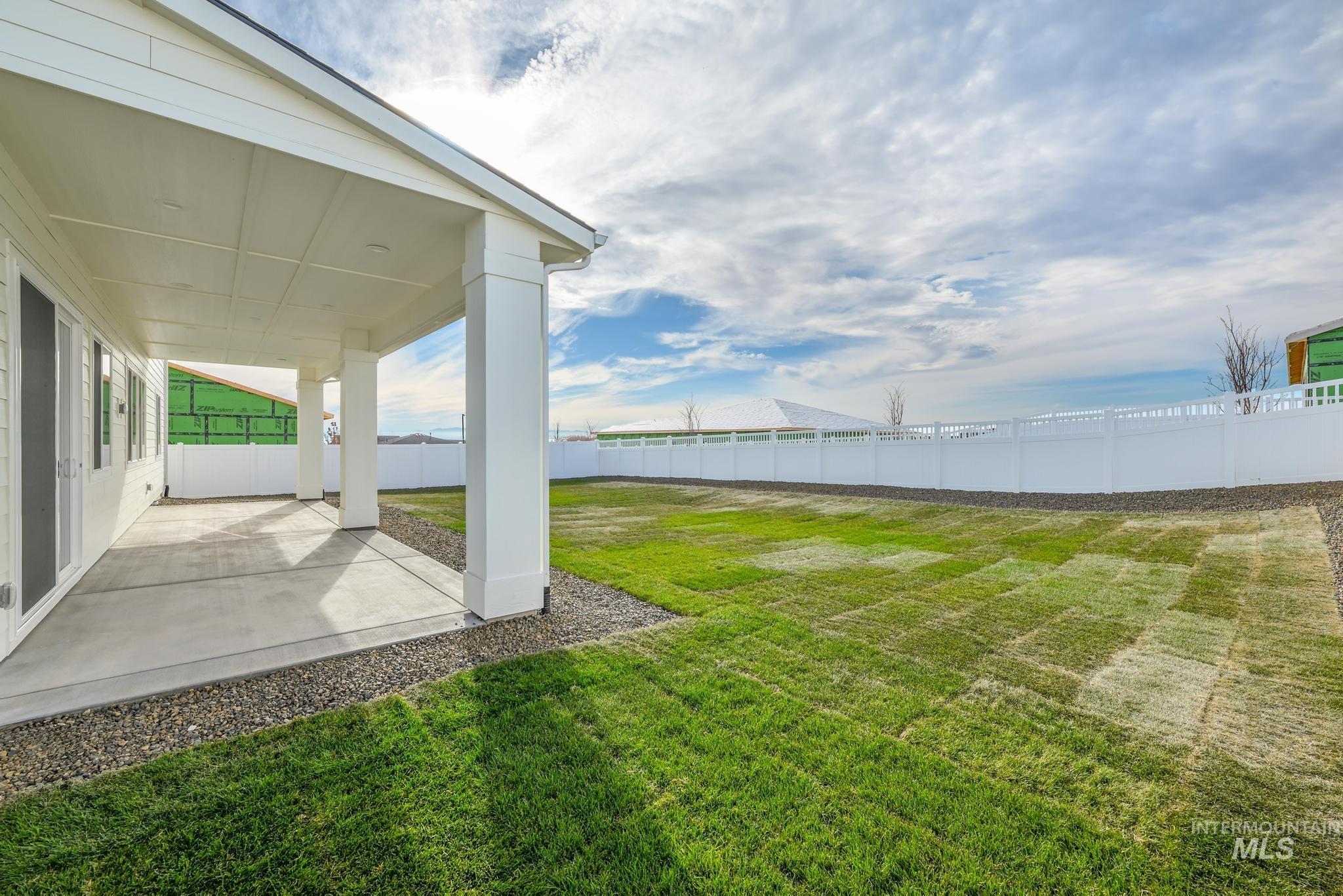 15249 Steel Cloud Avenue Caldwell, ID 83607 - Photo 36 of 46 Fenced backyard with a patio area