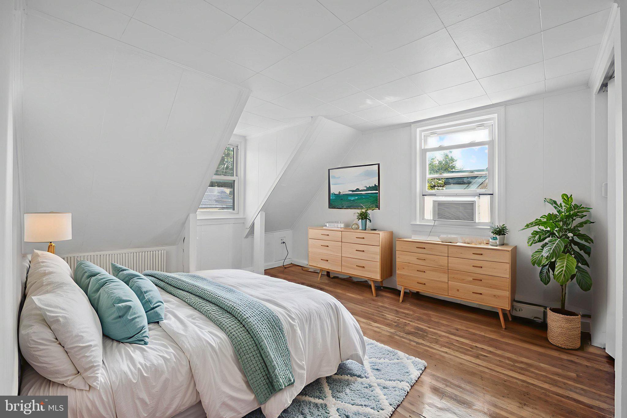 1005 Navahoe Drive Silver Spring, MD 20903 - Photo 17 of 34 a bedroom with a bed and a window