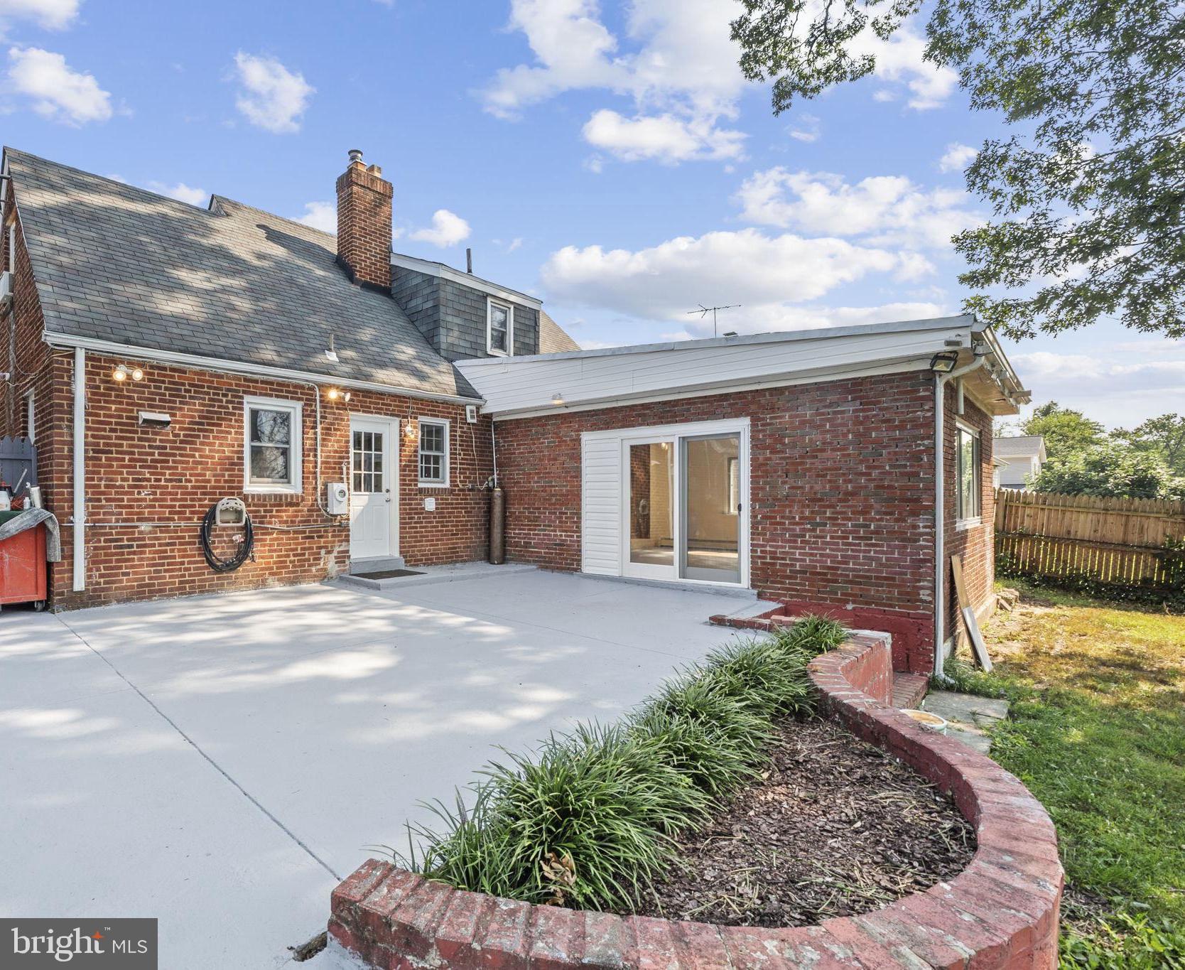 1005 Navahoe Drive Silver Spring, MD 20903 - Photo 4 of 34 a view of a house with backyard and garden