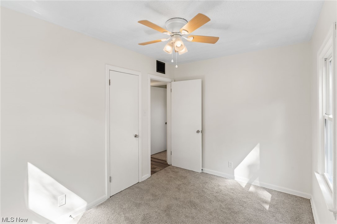 898 Reed Avenue Akron, OH 44306 - Photo 21 of 26 Bedroom featuring light carpet and ceiling fan