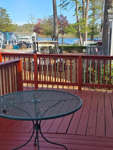a view of balcony with furniture