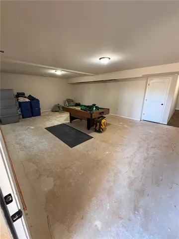 a view of a two chairs in the balcony