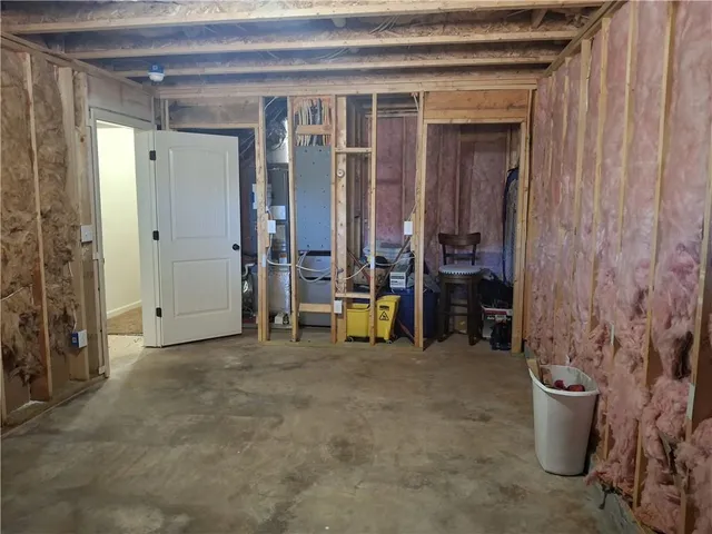 a view of a brick house with many windows