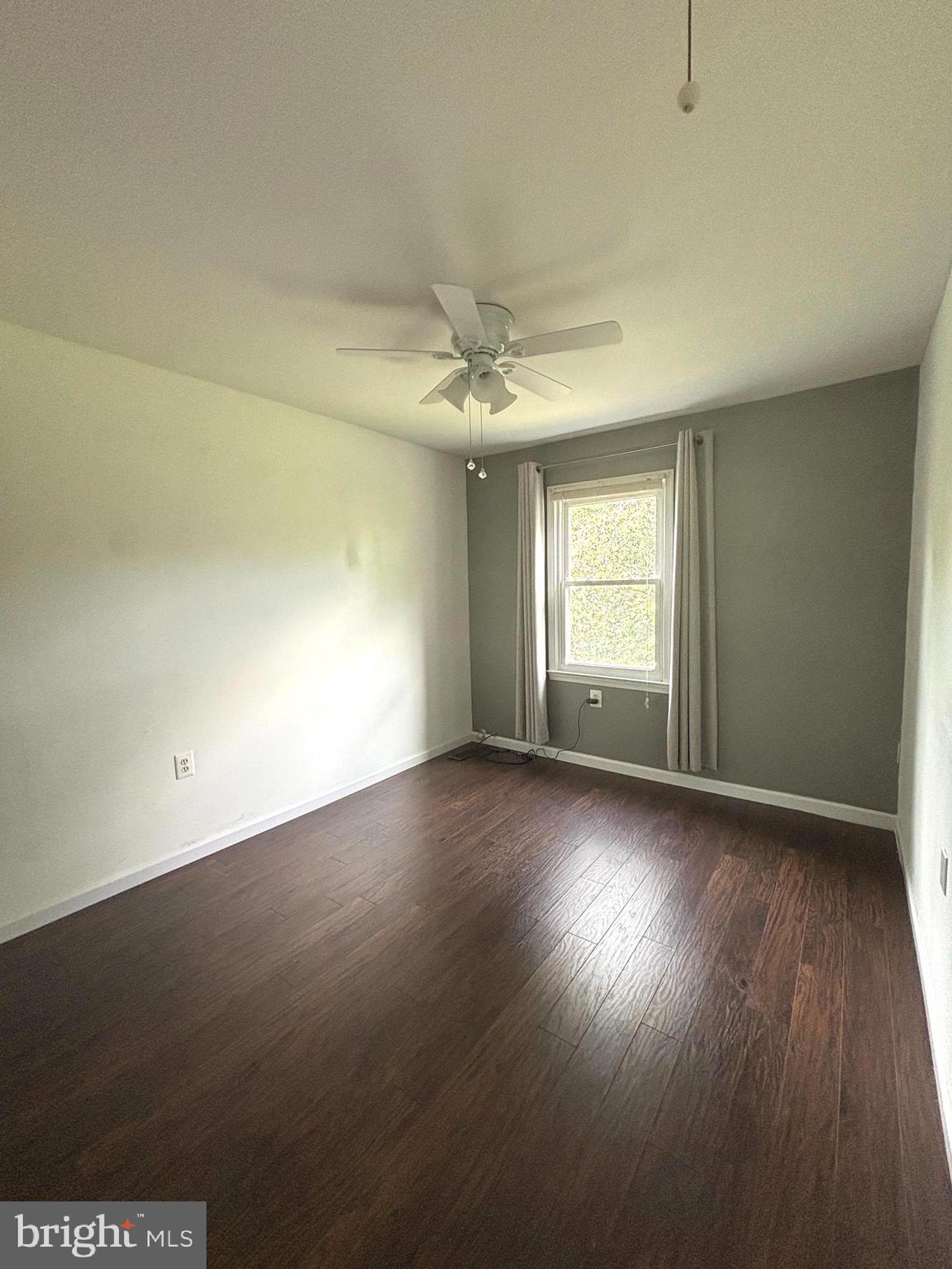 2847 Seminole Road Woodbridge, VA 22192 - Photo 13 of 38 an empty room with wooden floor and windows