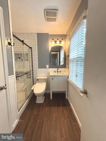 a backyard of a house with outdoor seating