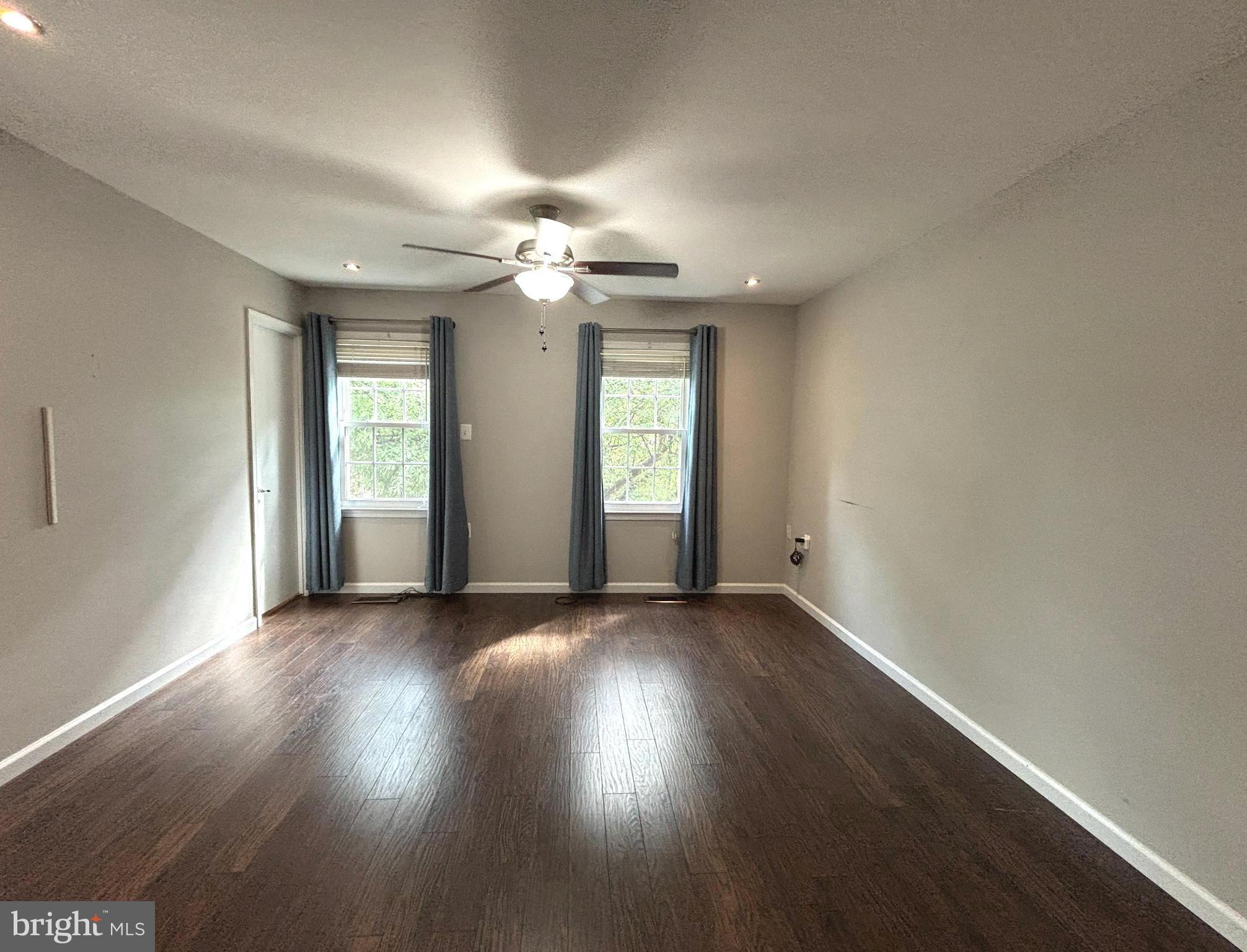 2847 Seminole Road Woodbridge, VA 22192 - Photo 21 of 38 an empty room with wooden floor and windows