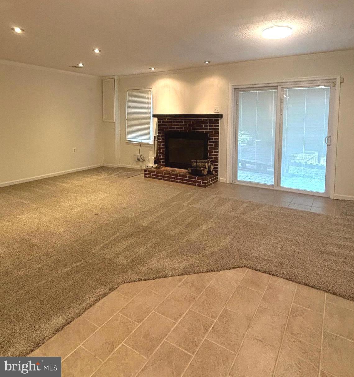 2847 Seminole Road Woodbridge, VA 22192 - Photo 24 of 38 an empty room with furniture and a fireplace