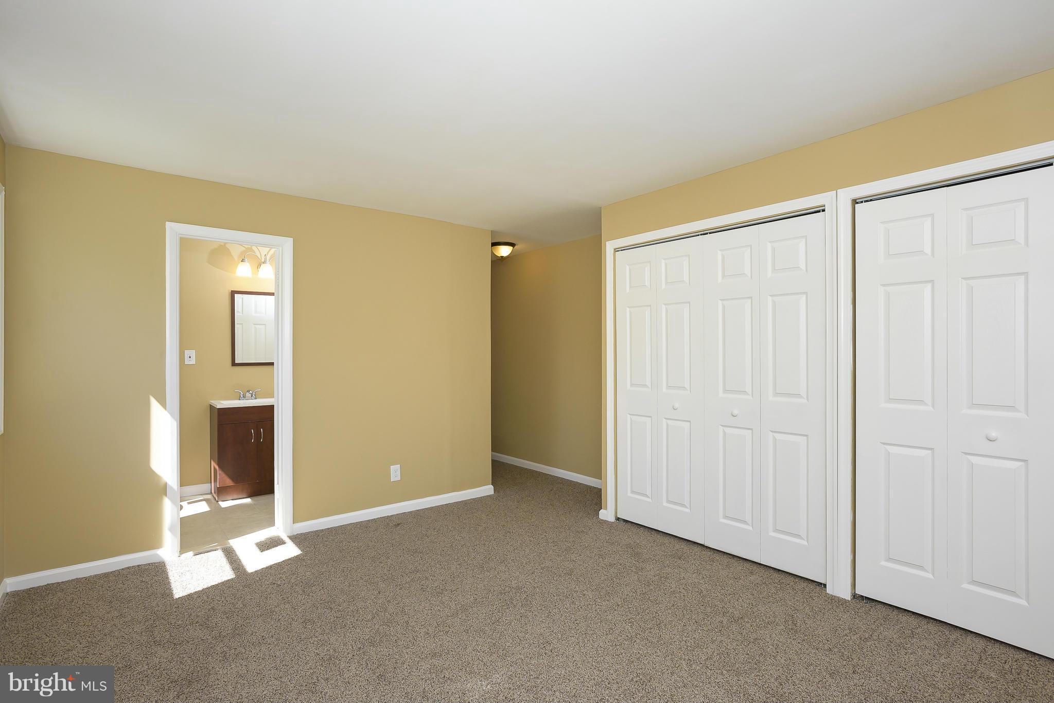 3423 Edcrest Road Baltimore, MD 21244 - Photo 14 of 30 an empty room with windows