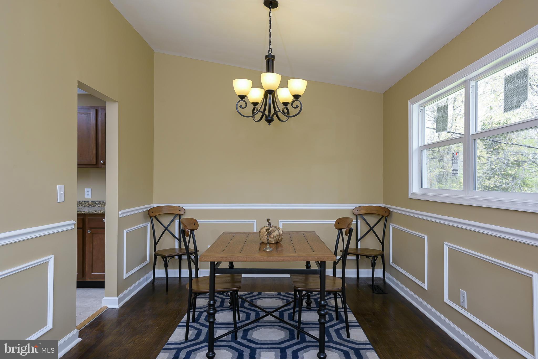 3423 Edcrest Road Baltimore, MD 21244 - Photo 8 of 30 a view of a dining room with furniture window and wooden floor