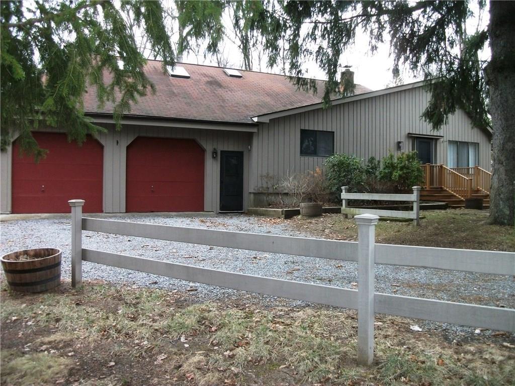 542 Ridgebury Road Ridgefield, CT 06877 - Photo 1 of 1 a house with trees in the background