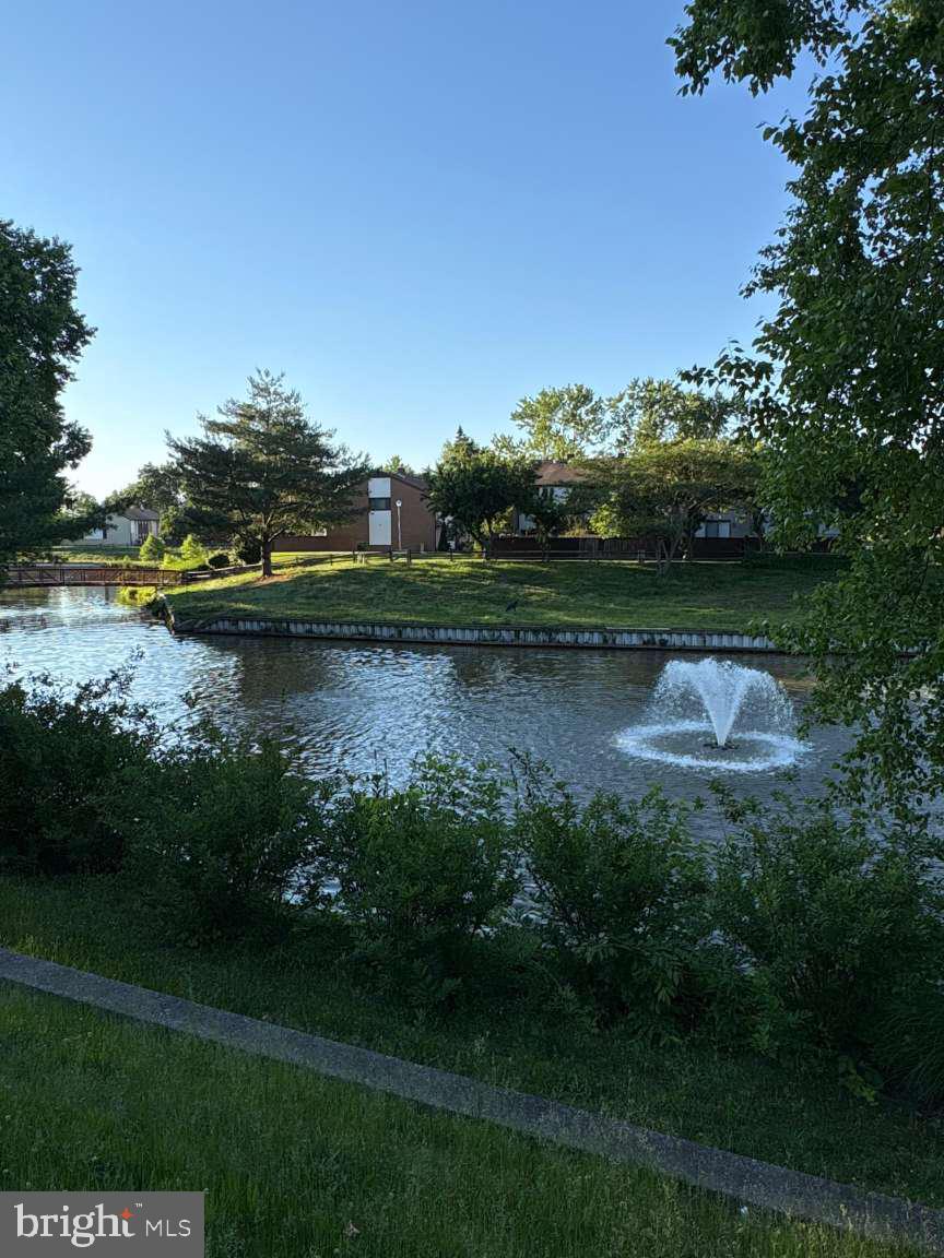 960 Jamestown Road Hightstown, NJ 08520 - Photo 18 of 18 a view of a lake with a house in the background