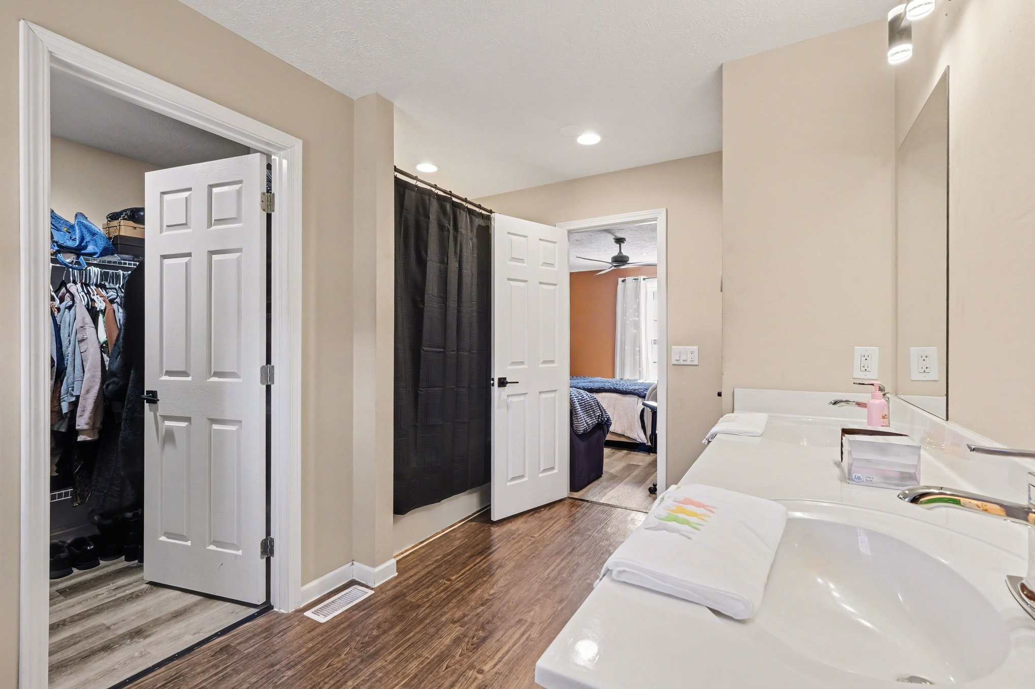 870 Newt Vanattia Road Hillsboro, TN 37342 - Photo 19 of 32 a spacious bathroom with a double vanity sink and a mirror