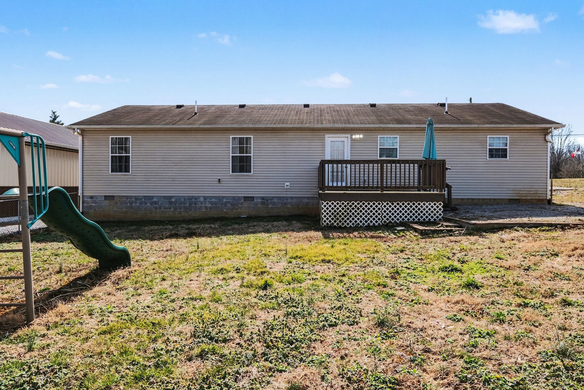 870 Newt Vanattia Road Hillsboro, TN 37342 - Photo 27 of 32 a view of a house with a yard