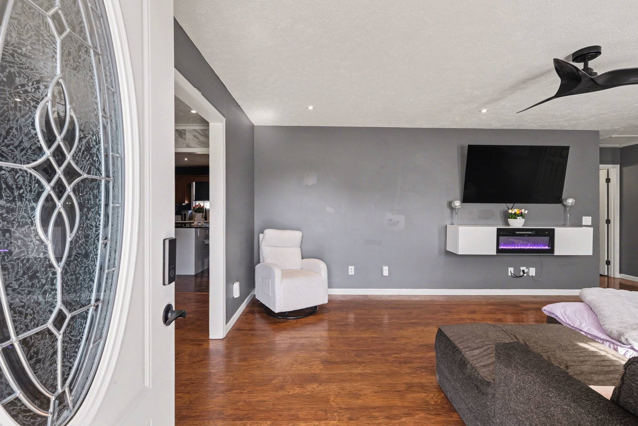 870 Newt Vanattia Road Hillsboro, TN 37342 - Photo 7 of 32 a living room with furniture and a flat screen tv