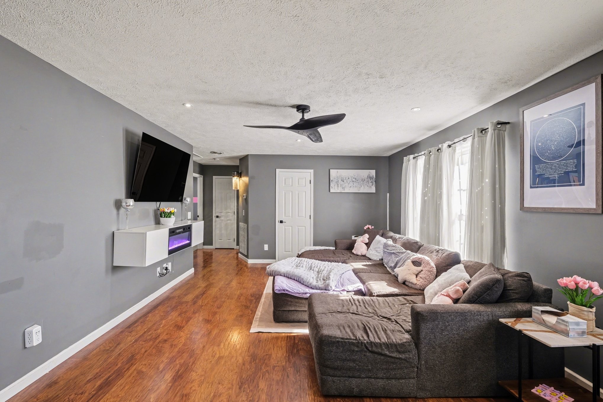 870 Newt Vanattia Road Hillsboro, TN 37342 - Photo 8 of 32 a bedroom with a bed window and a flat screen tv