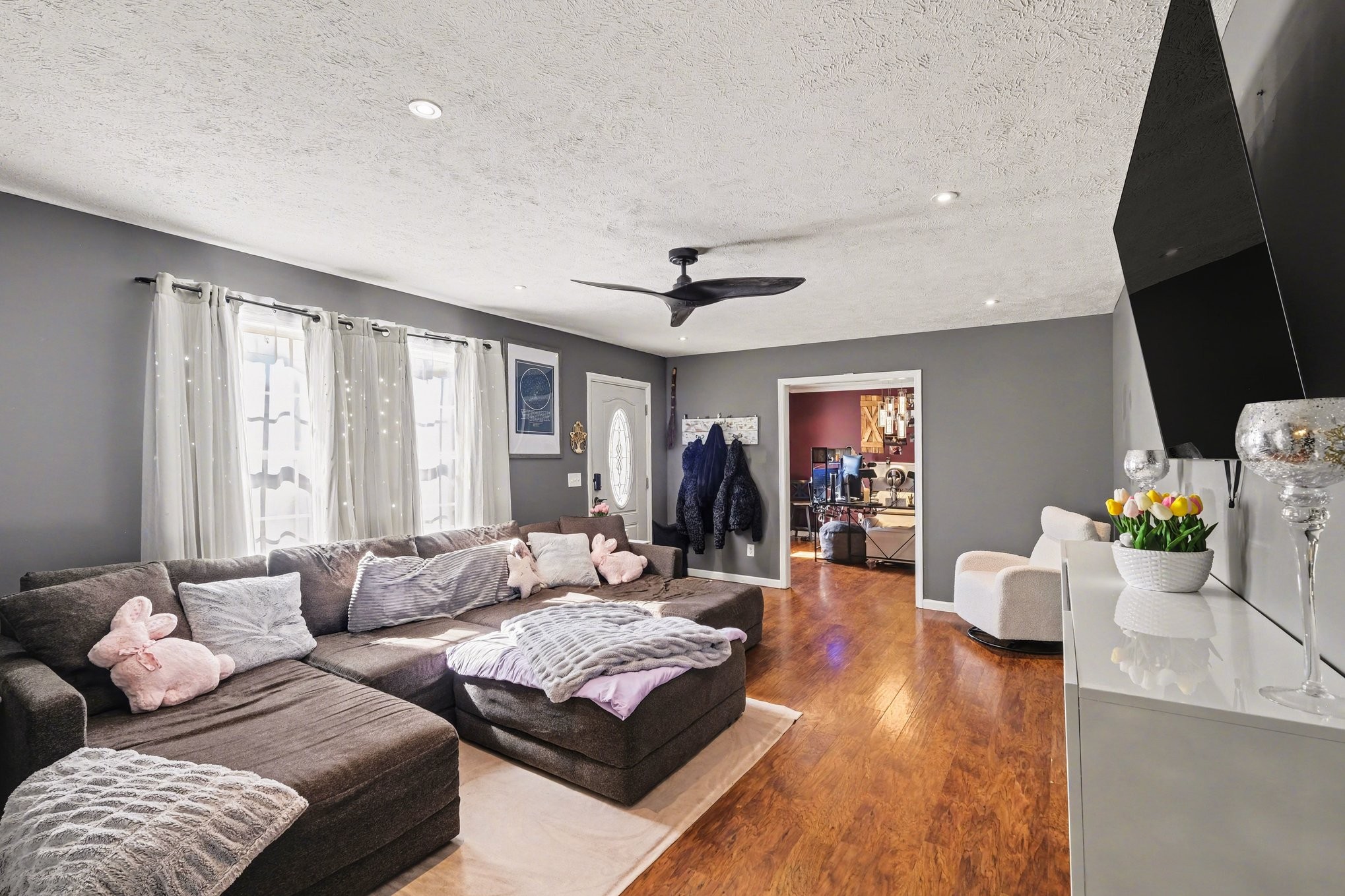870 Newt Vanattia Road Hillsboro, TN 37342 - Photo 9 of 32 a living room with furniture and wooden floor
