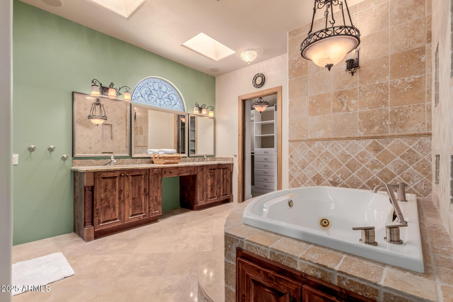 8540 East McDowell Road, Unit 121 Mesa, AZ 85207 - Photo 14 of 35 a bathroom with a bathtub and a sink