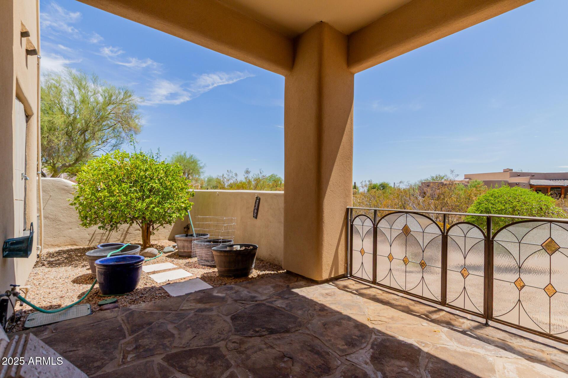 8540 East McDowell Road, Unit 121 Mesa, AZ 85207 - Photo 25 of 35 a view of balcony with furniture