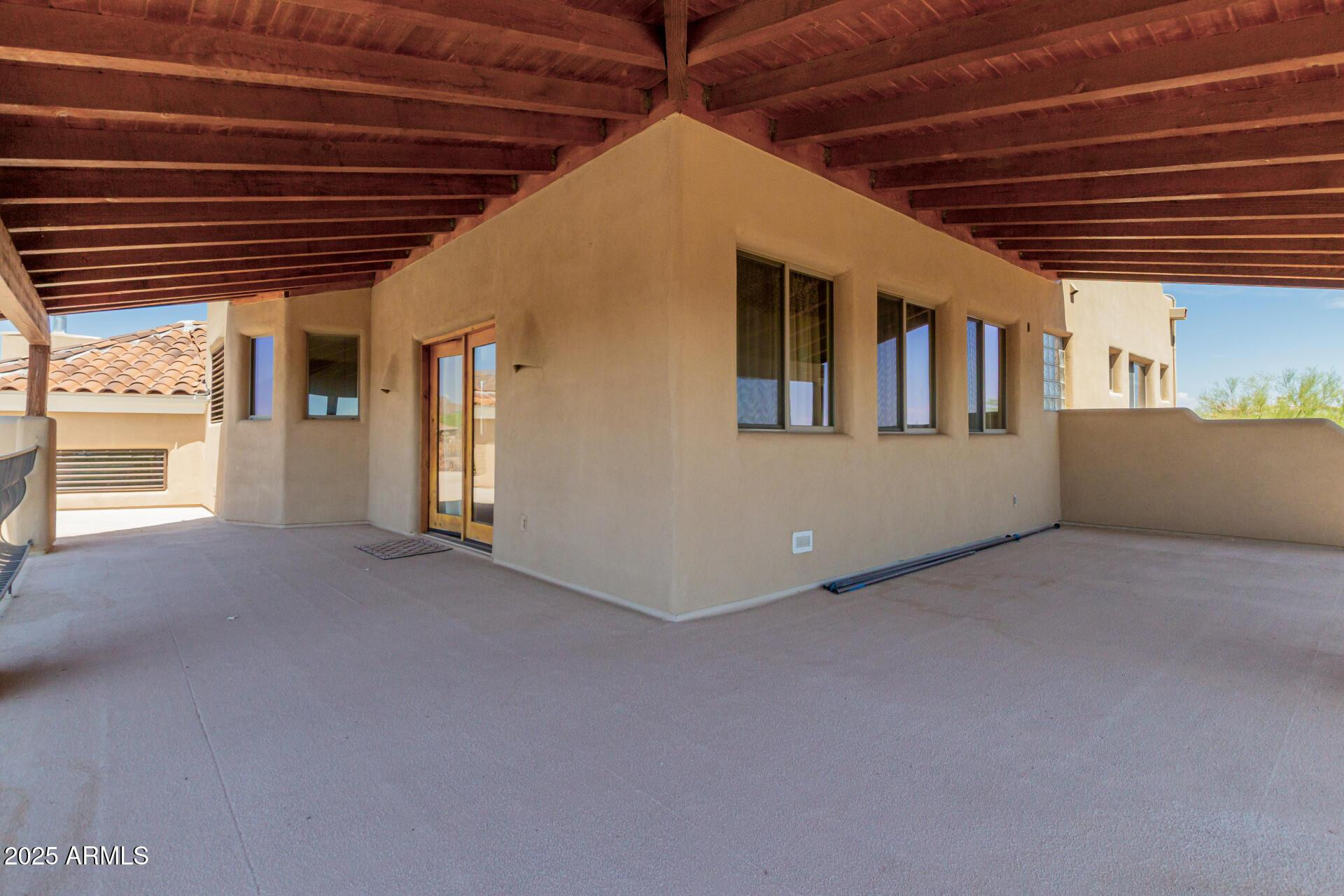 8540 East McDowell Road, Unit 121 Mesa, AZ 85207 - Photo 26 of 35 a view of a porch