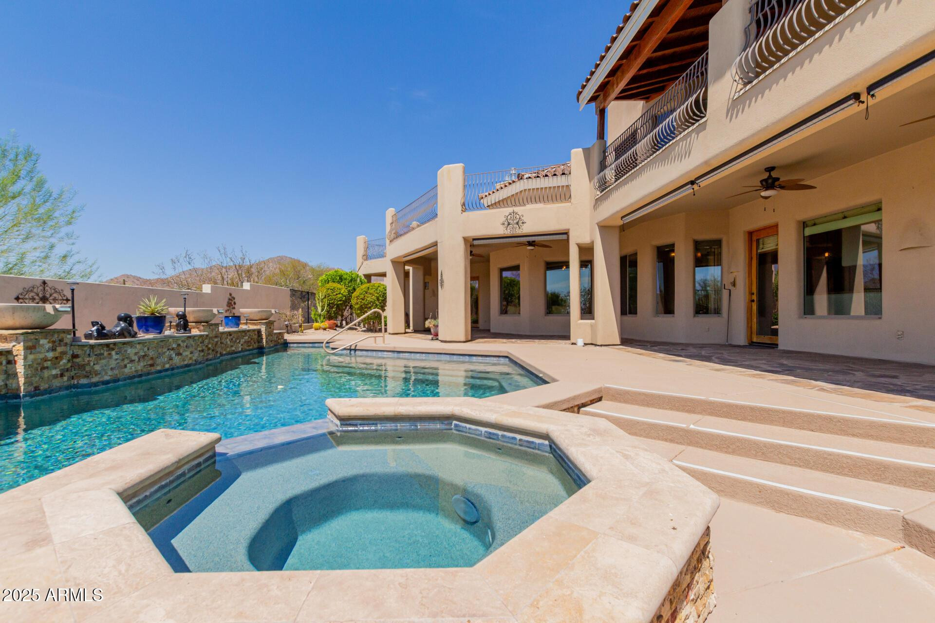 8540 East McDowell Road, Unit 121 Mesa, AZ 85207 - Photo 35 of 35 a view of a house with a swimming pool