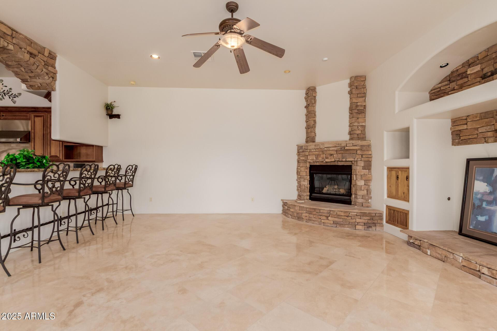 8540 East McDowell Road, Unit 121 Mesa, AZ 85207 - Photo 9 of 35 a view of livingroom with furniture and a fireplace