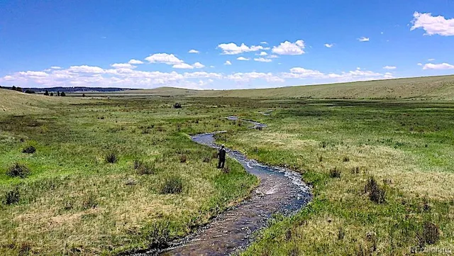 a view of a lake with a mountain in the background