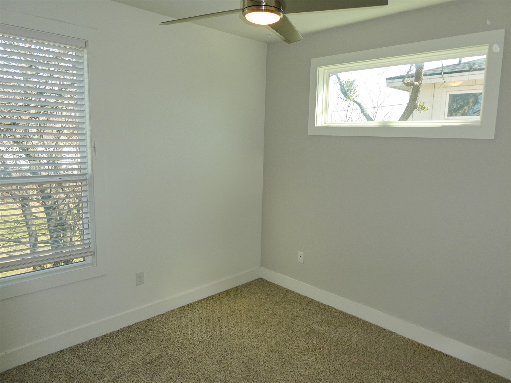 2512 Wheless Lane, Unit 5 Austin, TX 78723 - Photo 16 of 21 an empty room with a window