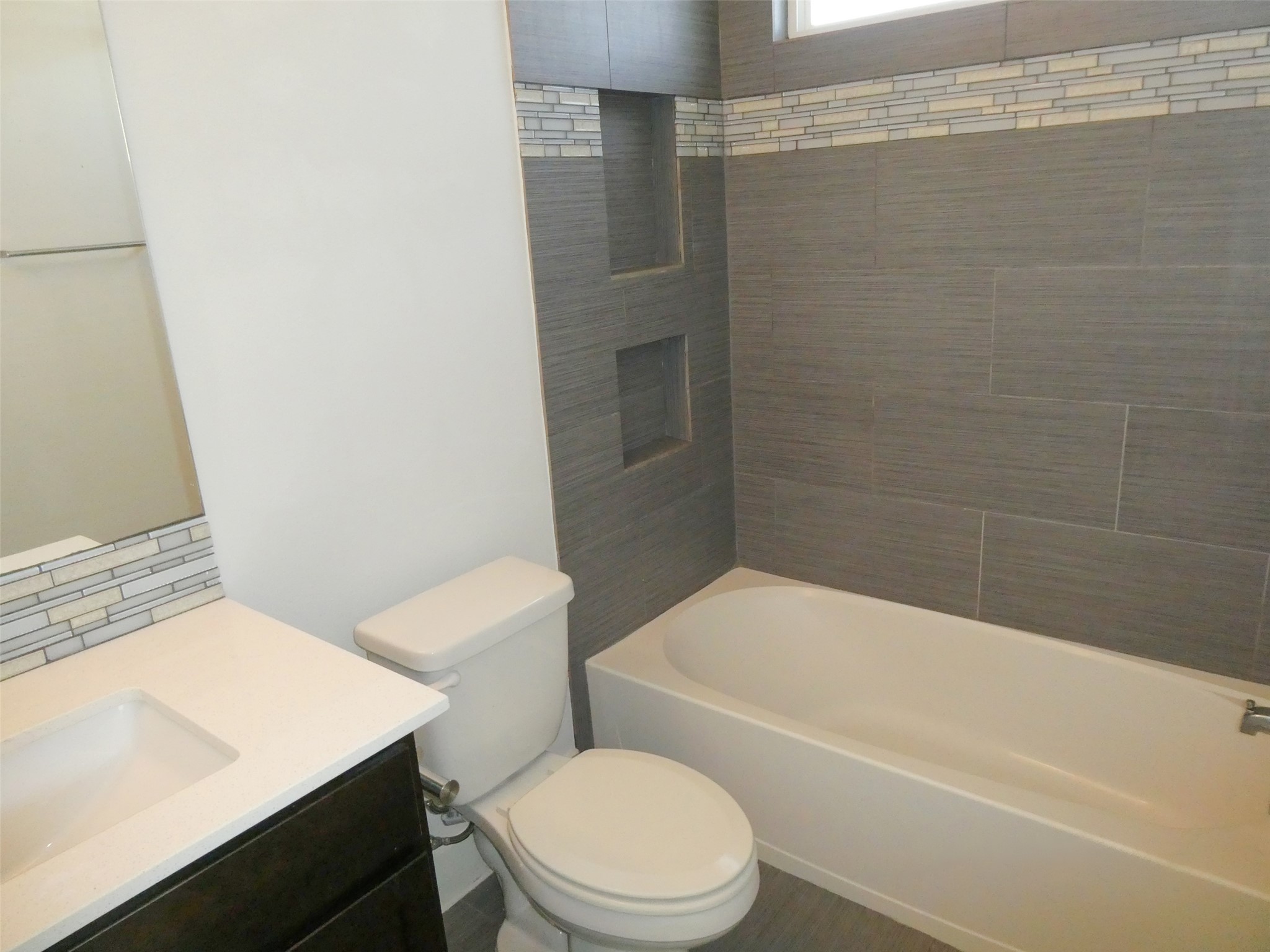 2512 Wheless Lane, Unit 5 Austin, TX 78723 - Photo 17 of 21 a bathroom with a toilet a sink and bathtub