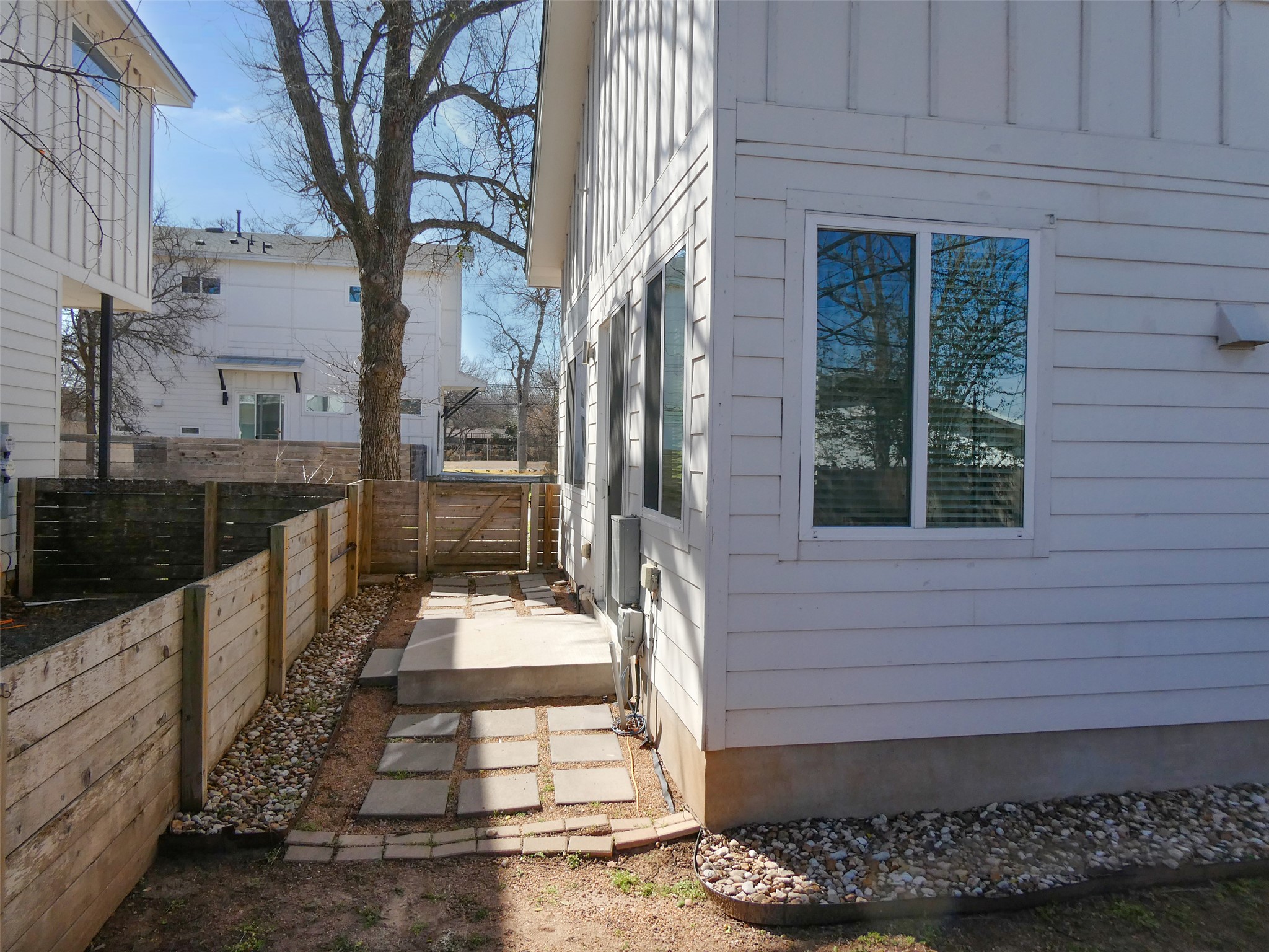 2512 Wheless Lane, Unit 5 Austin, TX 78723 - Photo 20 of 21 a view of a pathway with a house