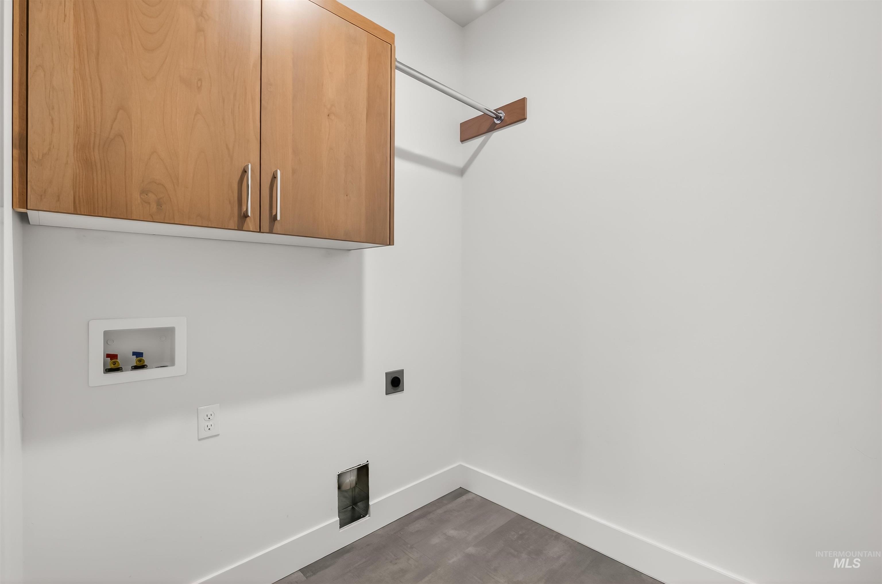 3710 22nd Street Lewiston, ID 83501 - Photo 13 of 36 Laundry area with cabinet space, hookup for an electric dryer, and washer hookup