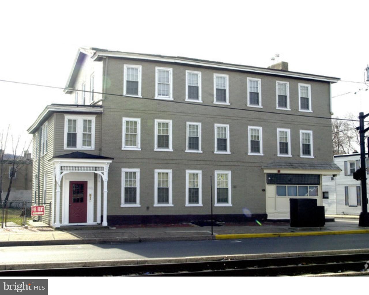 200 East Broad Street, Unit 7 Burlington, NJ 08016 - Photo 1 of 9 a front view of building with yard