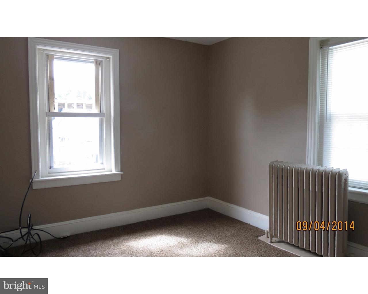 200 East Broad Street, Unit 7 Burlington, NJ 08016 - Photo 7 of 9 a black and white photo of a living room
