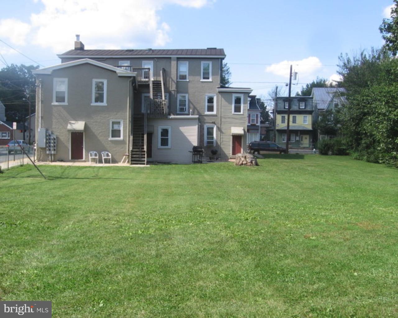 200 East Broad Street, Unit 7 Burlington, NJ 08016 - Photo 9 of 9 a view of a house with a yard and sitting area