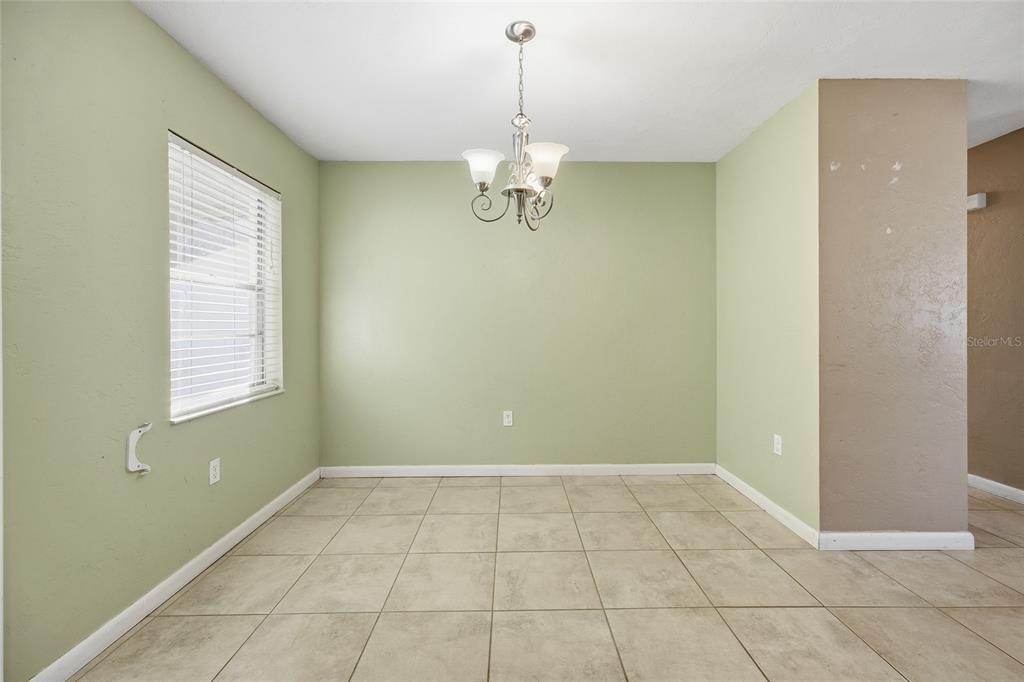 2140 Northeast 39th Street Ocala, FL 34479 - Photo 15 of 28 a view of an empty room with a window