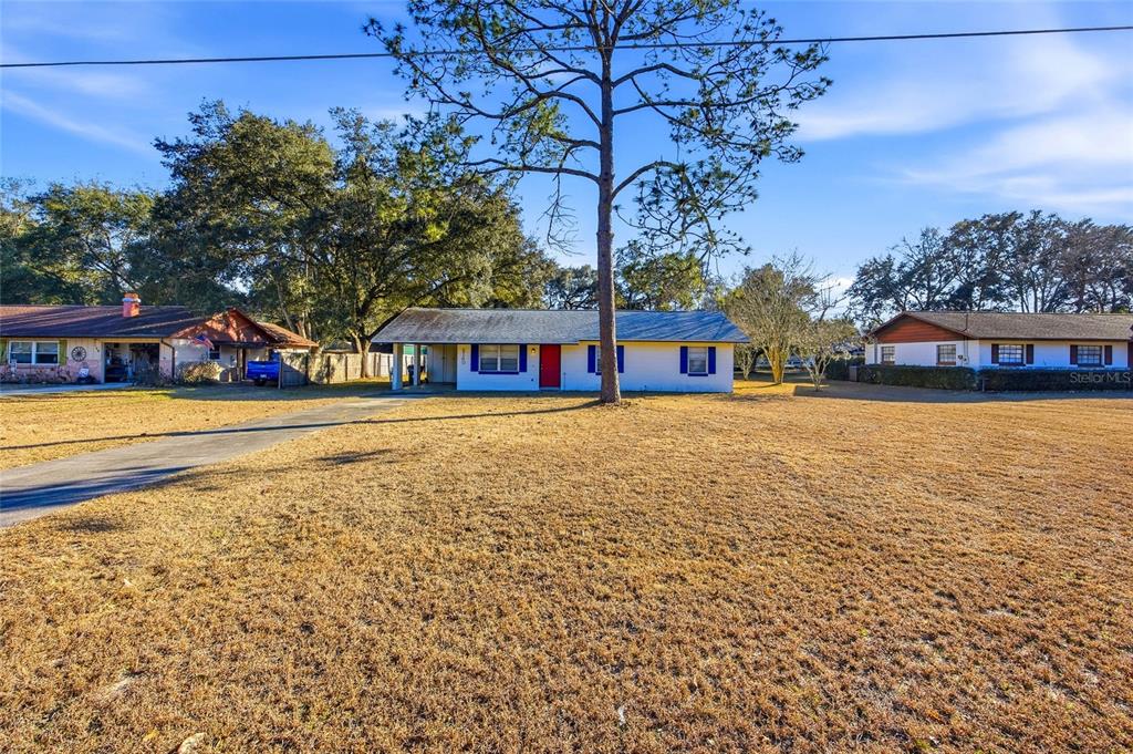 2140 Northeast 39th Street Ocala, FL 34479 - Photo 2 of 28 a view of swimming pool with outdoor seating and yard